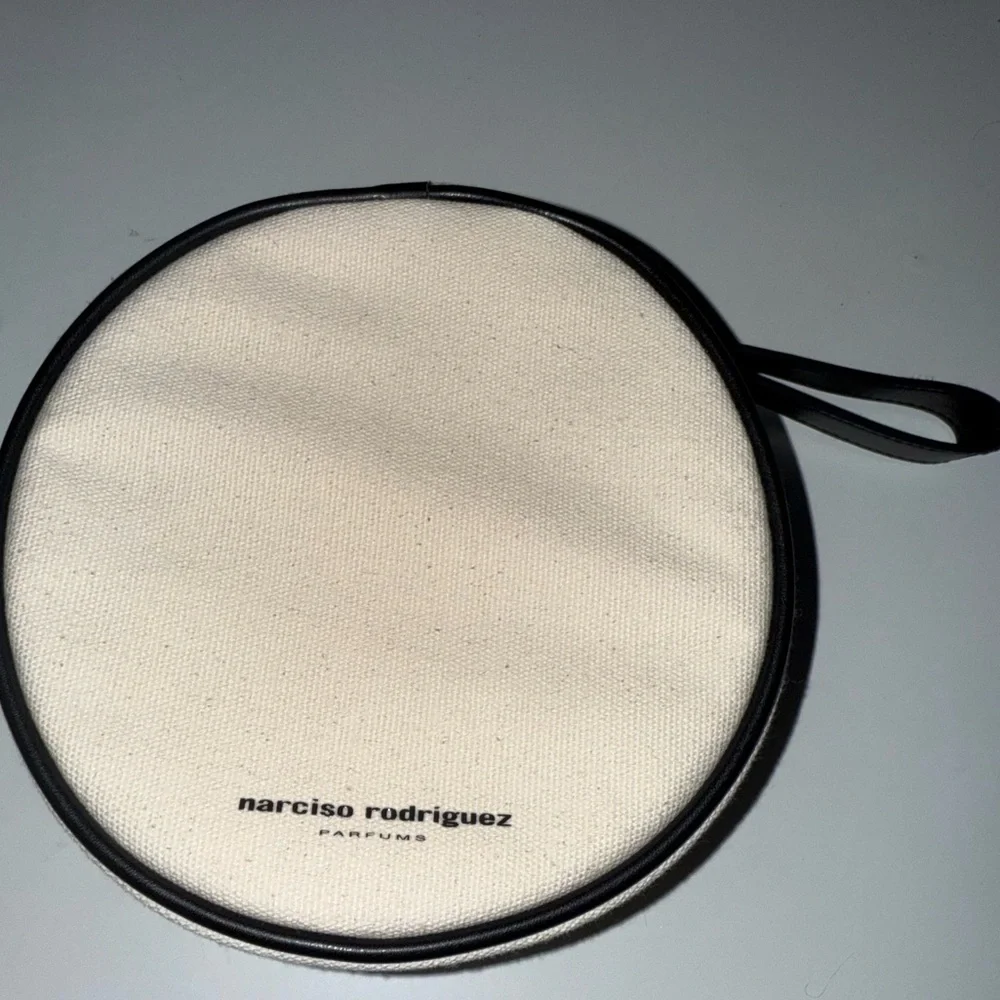Narciso Rodriguez Cream and Black Circular pouch bag
